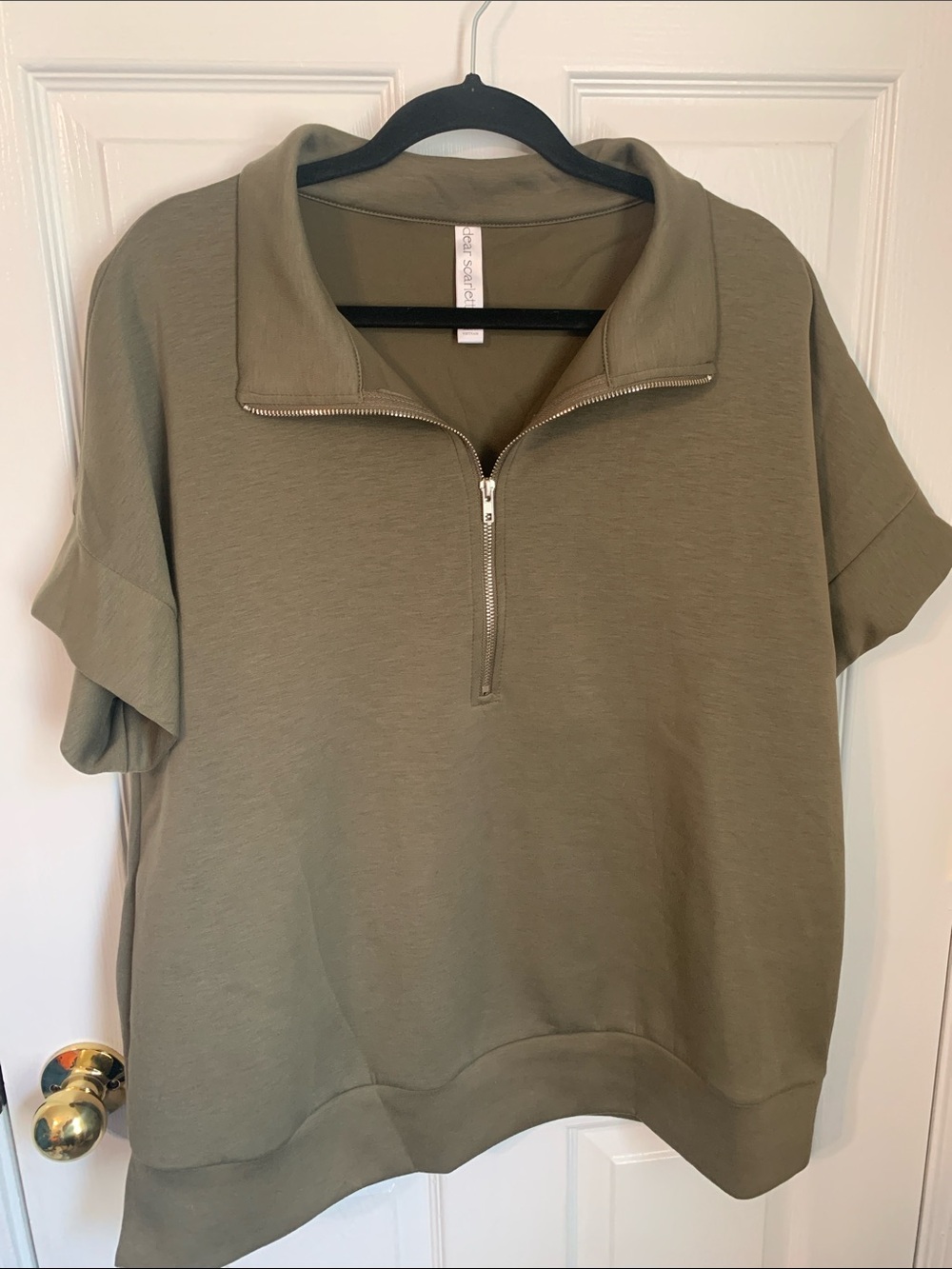 Dear Scarlett 1x short sleeve half zip olive top